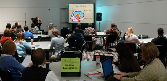 Annie talking with educators at the National Middle School Association Conference, 2008